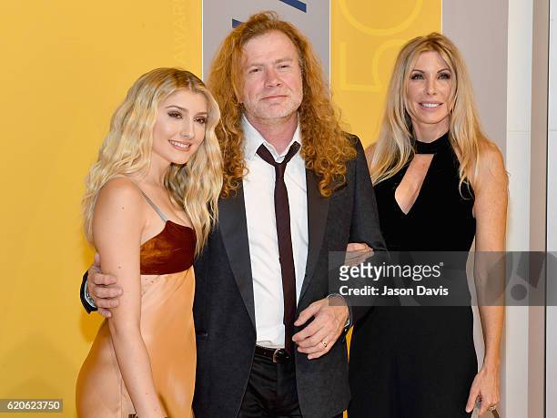Electra Mustaine, Dave Mustaine and Pamela Anne Casselberry attend the 50th annual CMA Awards at the Bridgestone Arena on November 2, 2016 in...