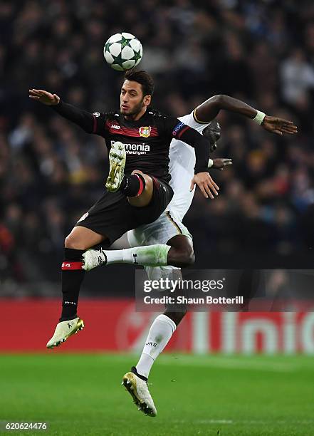 Moussa Sissoko of Tottenham Hotspur and Hakan Calhanoglu of Bayer Leverkusen in action during the UEFA Champions League Group E match between...