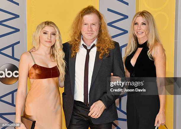 Electra Mustaine, Dave Mustaine and Pamela Anne Casselberry attend the 50th annual CMA Awards at the Bridgestone Arena on November 2, 2016 in...