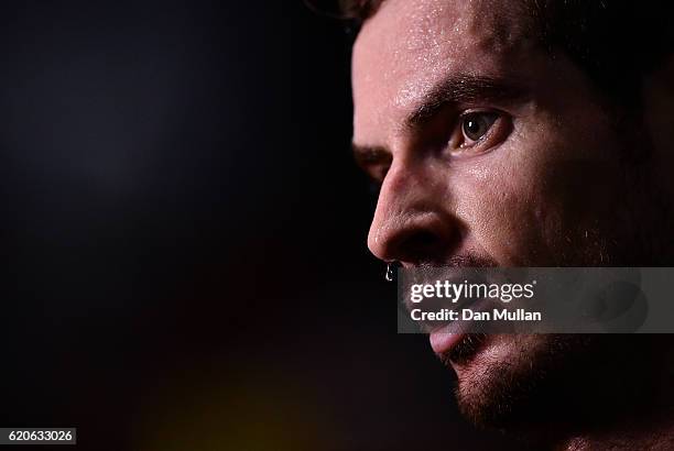 Andy Murray of Great Britain looks on following his Mens Singles second round match against Fernando Verdasco of Spain on day three of the BNP...