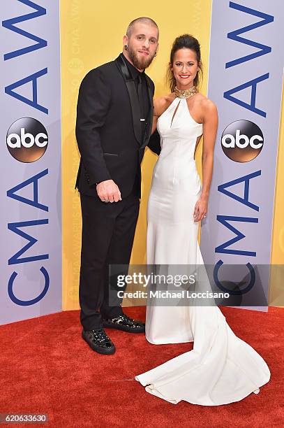 Singer-songwriter Brantley Gilbert and Amber Cochran attend the 50th annual CMA Awards at the Bridgestone Arena on November 2, 2016 in Nashville,...