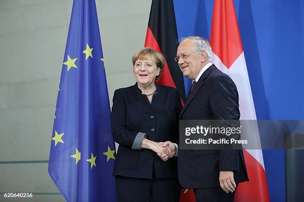 Federal Chancellor Angela Merkel receives the Federal President of the Swiss Confederation, Johann Schneider-Ammann, in the Federal Chancellery. The...