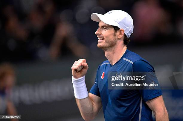 Andy Murray of Great Britain reacts after winning the Men's second round match against Frenando Verdacso of Spain on day three of the BNP Paribas...