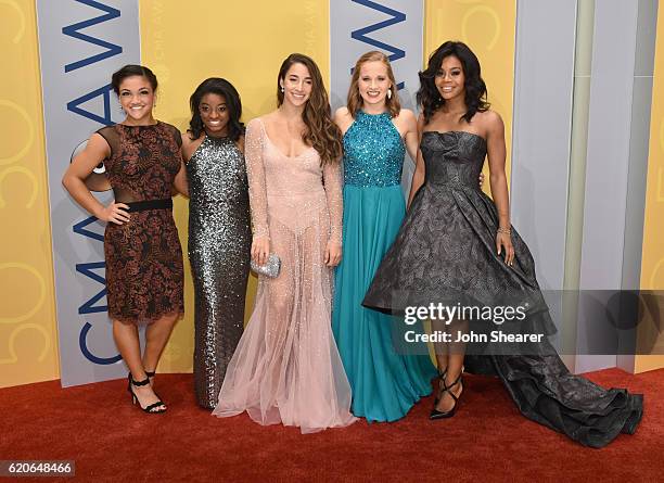 Olympic gymnasts Laurie Hernandez, Simone Biles, Aly Raisman, Madison Kocian, and Gabby Douglas attend the 50th annual CMA Awards at the Bridgestone...