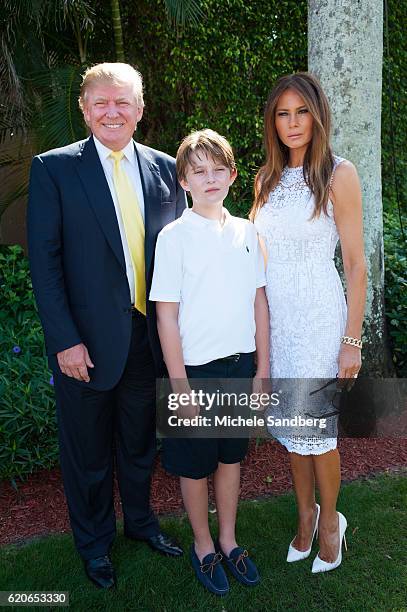 Businessman Donald Trump, son Barron, and wife Melania at the Trump Invitational Grand Prix at Mar-a-Lago, Palm Beach, Florida, January 4, 2015.