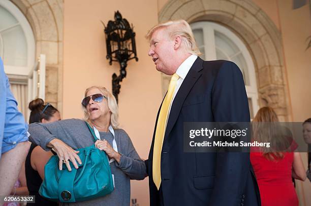 Linda Marx and businessman Donald Trump at the Trump Invitational Grand Prix at Mar-a-Lago, Palm Beach, Florida, January 4, 2015.