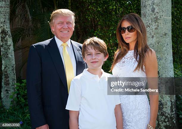 Businessman Donald Trump, son Barron, and wife Melania at the Trump Invitational Grand Prix at Mar-a-Lago, Palm Beach, Florida, January 4, 2015.