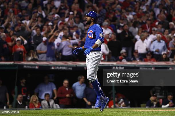 Dexter Fowler of the Chicago Cubs celebrates after hitting a lead off home run in the first inning against the Cleveland Indians in Game Seven of the...