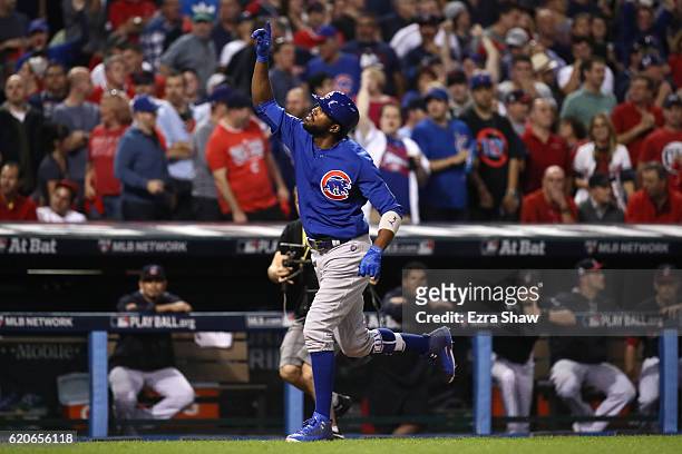 Dexter Fowler of the Chicago Cubs celebrates after hitting a lead off home run in the first inning against the Cleveland Indians in Game Seven of the...