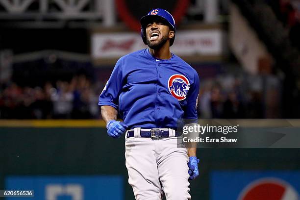 Dexter Fowler of the Chicago Cubs celebrates after hitting a lead off home run in the first inning against the Cleveland Indians in Game Seven of the...