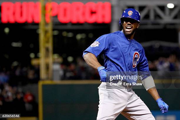 Dexter Fowler of the Chicago Cubs celebrates after hitting a lead off home run in the first inning against the Cleveland Indians in Game Seven of the...