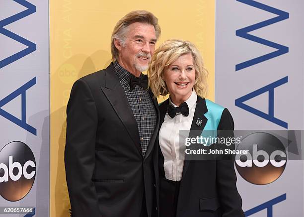 John Easterling and singer Olivia Newton-John attend the 50th annual CMA Awards at the Bridgestone Arena on November 2, 2016 in Nashville, Tennessee.