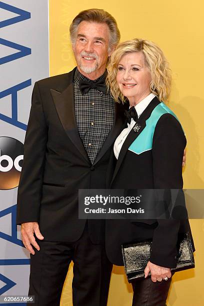 John Easterling and singer Olivia Newton-John attend the 50th annual CMA Awards at the Bridgestone Arena on November 2, 2016 in Nashville, Tennessee.