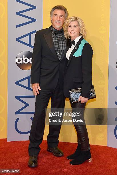 John Easterling and singer Olivia Newton-John attend the 50th annual CMA Awards at the Bridgestone Arena on November 2, 2016 in Nashville, Tennessee.