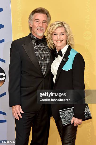 John Easterling and Olivia Newton-John attend the 50th annual CMA Awards at the Bridgestone Arena on November 2, 2016 in Nashville, Tennessee.