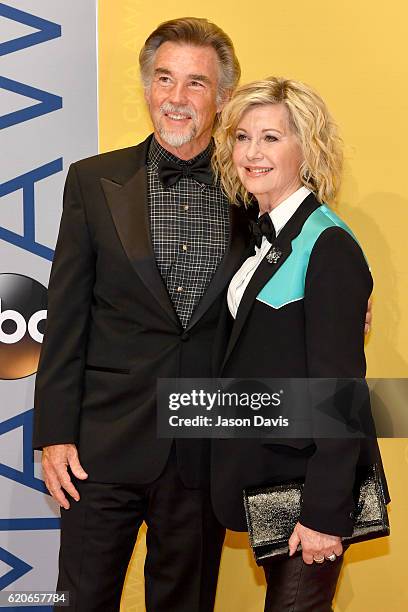 John Easterling and Olivia Newton-John attend the 50th annual CMA Awards at the Bridgestone Arena on November 2, 2016 in Nashville, Tennessee.