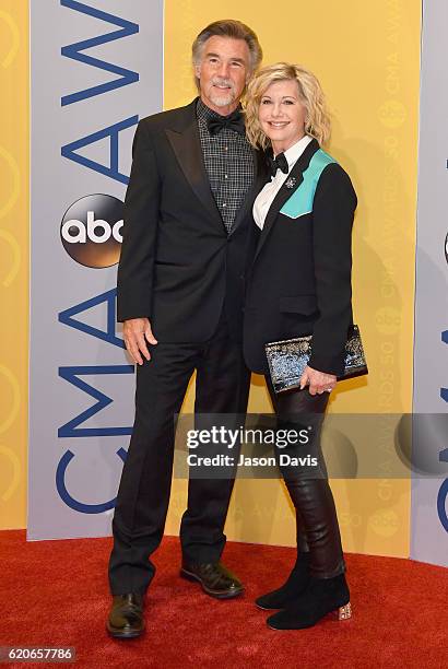 John Easterling and Olivia Newton-John attend the 50th annual CMA Awards at the Bridgestone Arena on November 2, 2016 in Nashville, Tennessee.