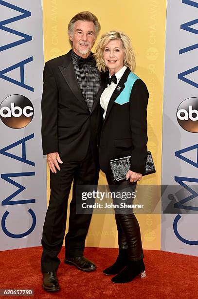 John Easterling and Olivia Newton-John attend the 50th annual CMA Awards at the Bridgestone Arena on November 2, 2016 in Nashville, Tennessee.