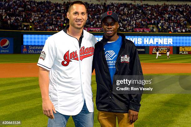 Davontre Cohen from the Boys & Girls Clubs of The Western Reserve in Akron, Ohio poses for a photo with former Cleveland Indians player Travis Hafner...