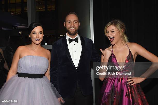 Kacey Musgraves, Ruston Kelly, and Kelsea Ballerini attend the 50th annual CMA Awards at the Bridgestone Arena on November 2, 2016 in Nashville,...