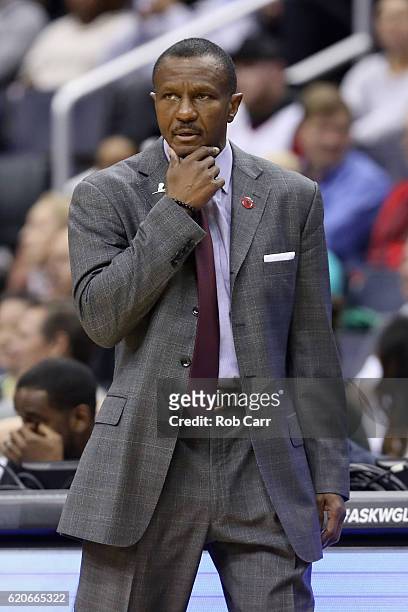 Head coach Dwane Casey of the Toronto Raptors looks on against the Washington Wizards in the first half at Verizon Center on November 2, 2016 in...