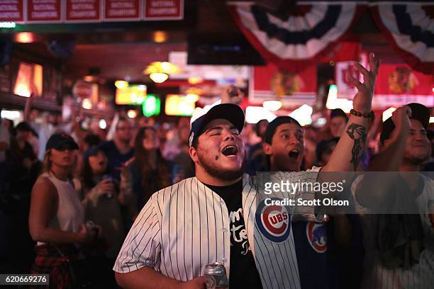 Chicago Cubs fans watch the Chicago Cubs play the Cleveland Indians during game seven of the 2016 World Series at Sluggers in the Wrigleyville...