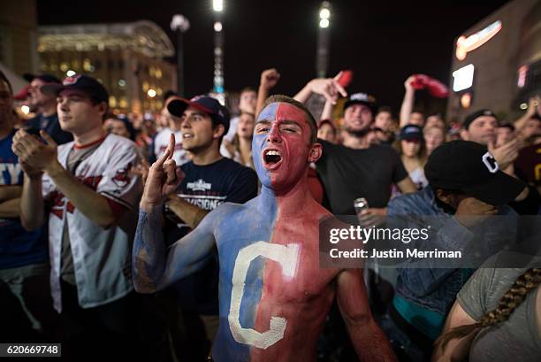 Cam Lathem of Ashville, Ohio cheers on the Indians outside of Progressive Field during game 7 of the World Series between the Cleveland Indians and...