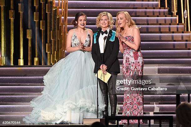 Hayley Orrantia, Olivia Newton-John, and Wendi McLendon-Covey speak onstage at the 50th annual CMA Awards at the Bridgestone Arena on November 2,...
