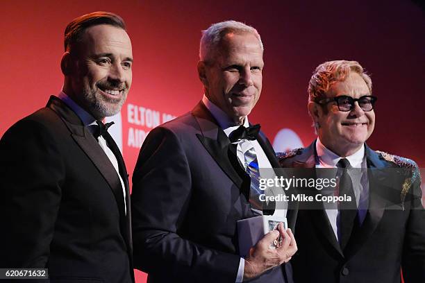 David Furnish, Steve Tisch, and Sir Elton John take the stage at the 15th Annual Elton John AIDS Foundation An Enduring Vision Benefit at Cipriani...