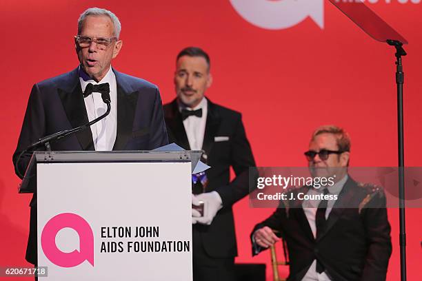 Steve Tisch, David Furnish, and Sir Elton John take the stage at the 15th Annual Elton John AIDS Foundation An Enduring Vision Benefit at Cipriani...