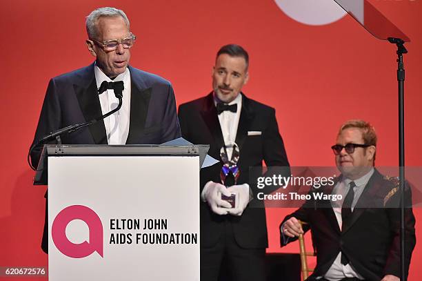 Steve Tisch, David Furnish, and Sir Elton John take the stage at the 15th Annual Elton John AIDS Foundation An Enduring Vision Benefit at Cipriani...