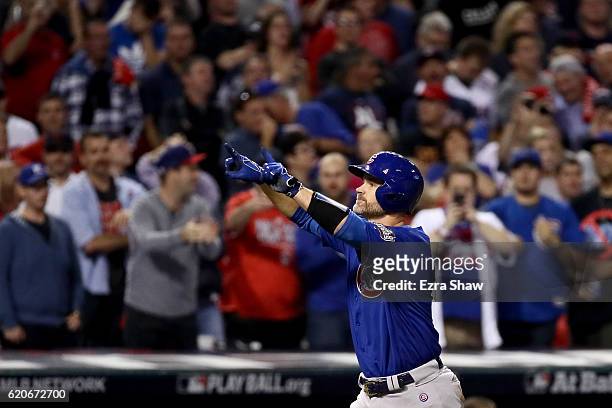 David Ross of the Chicago Cubs celebrates after hitting a solo home run during the sixth inning against the Cleveland Indians in Game Seven of the...