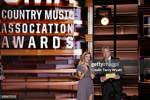 Kirk Herbstreit and Samantha Ponder speak onstage at the 50th annual CMA Awards at the Bridgestone Arena on November 2, 2016 in Nashville, Tennessee.