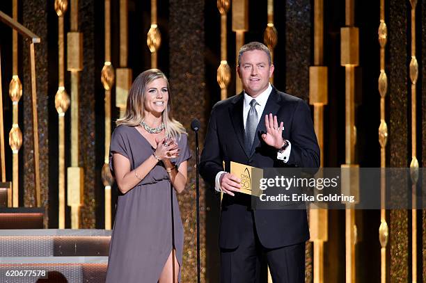 Kirk Herbstreit and Samantha Ponder speak onstage at the 50th annual CMA Awards at the Bridgestone Arena on November 2, 2016 in Nashville, Tennessee.