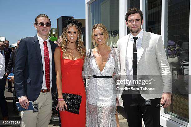 Cam Arnold, Ruby and Lucy Brownless and Paddy McCartin arrive at Oaks Day at Flemington Racecourse on November 3, 2016 in Melbourne, Australia.