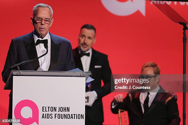 Steve Tisch, David Furnish, and Sir Elton John take the stage at the 15th Annual Elton John AIDS Foundation An Enduring Vision Benefit at Cipriani...