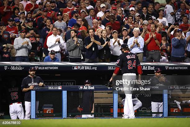 Andrew Miller of the Cleveland Indians walks to the dugout after being relieved during the seventh inning against the Chicago Cubs in Game Seven of...