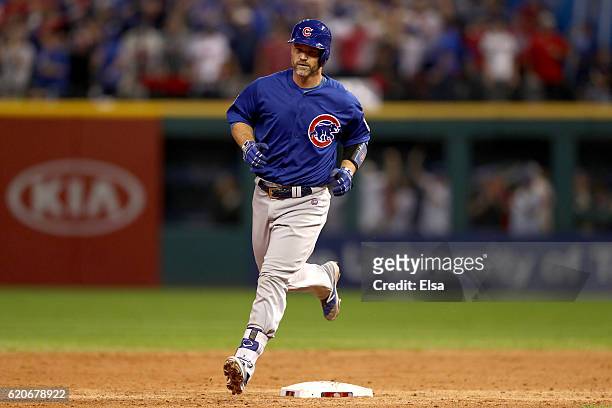 David Ross of the Chicago Cubs runs the bases after hitting a solo home run during the sixth inning against the Cleveland Indians in Game Seven of...