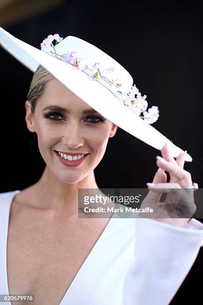 Nikki Phillips poses at the Fashions On The Field Marquee on Crown Oaks Day at Flemington Racecourse on November 3, 2016 in Melbourne, Australia.
