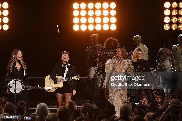 Beyonce performs onstage with Emily Robison, Natalie Maines, and Martie Maguire of Dixie Chicks at the 50th annual CMA Awards at the Bridgestone...