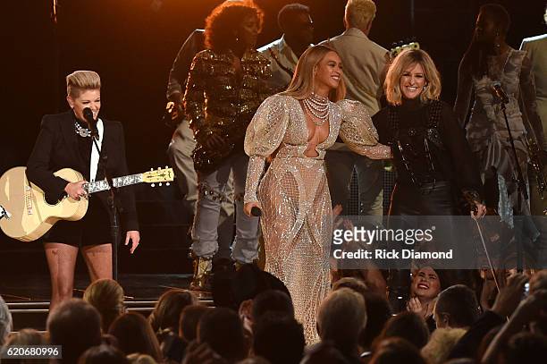 Beyonce performs onstage with Martie Maguire of Dixie Chicks at the 50th annual CMA Awards at the Bridgestone Arena on November 2, 2016 in Nashville,...