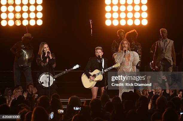 Beyonce performs onstage with Emily Robison and Natalie Maines of Dixie Chicks at the 50th annual CMA Awards at the Bridgestone Arena on November 2,...