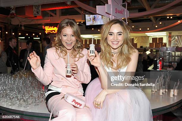 Entrepreneur Poppy Elizabeth Jamie and actress Suki Waterhouse attend Poppy Jamie, Suki Waterhouse, Leo Seigal and Cade Hudson celebration of the...