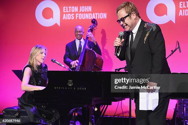 Diana Krall and Elton John perform at the 15th Annual Elton John AIDS Foundation An Enduring Vision Benefit at Cipriani Wall Street on November 2,...
