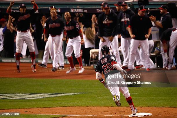 Rajai Davis of the Cleveland Indians runs the bases after hitting a two-run home run during the eighth inning to tie the game 6-6 against the Chicago...