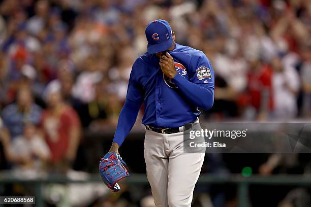 Aroldis Chapman of the Chicago Cubs reacts after Rajai Davis of the Cleveland Indians , hit a two-run home run during the eighth inning to tie the...