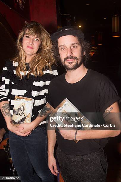 Daphne Burki and Gunther Love attend the Valerie Damidot Book Signing for "Le Coeur Sur La Main, Le Doigt Sur La Gachette" at Buddha Bar on November...