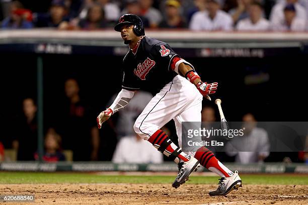 Rajai Davis of the Cleveland Indians reacts after hitting a two-run home run during the eighth inning to tie the game 6-6 against the Chicago Cubs in...