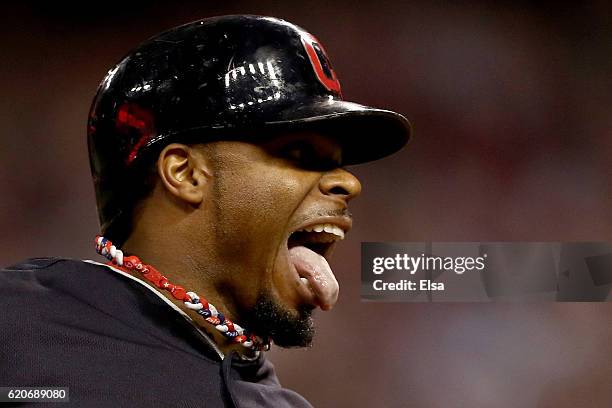 Rajai Davis of the Cleveland Indians celebrates as he runs the bases after hitting a two-run home run during the eighth inning to tie the game 6-6...