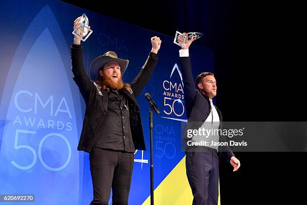 John Osborne and TJ Osborne of the Brothers Osborne pose with the award for Vocal Duo of the Year at the 50th annual CMA Awards at the Bridgestone...